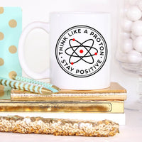 Thumbnail for Think Like A Proton Stay Positive Mug